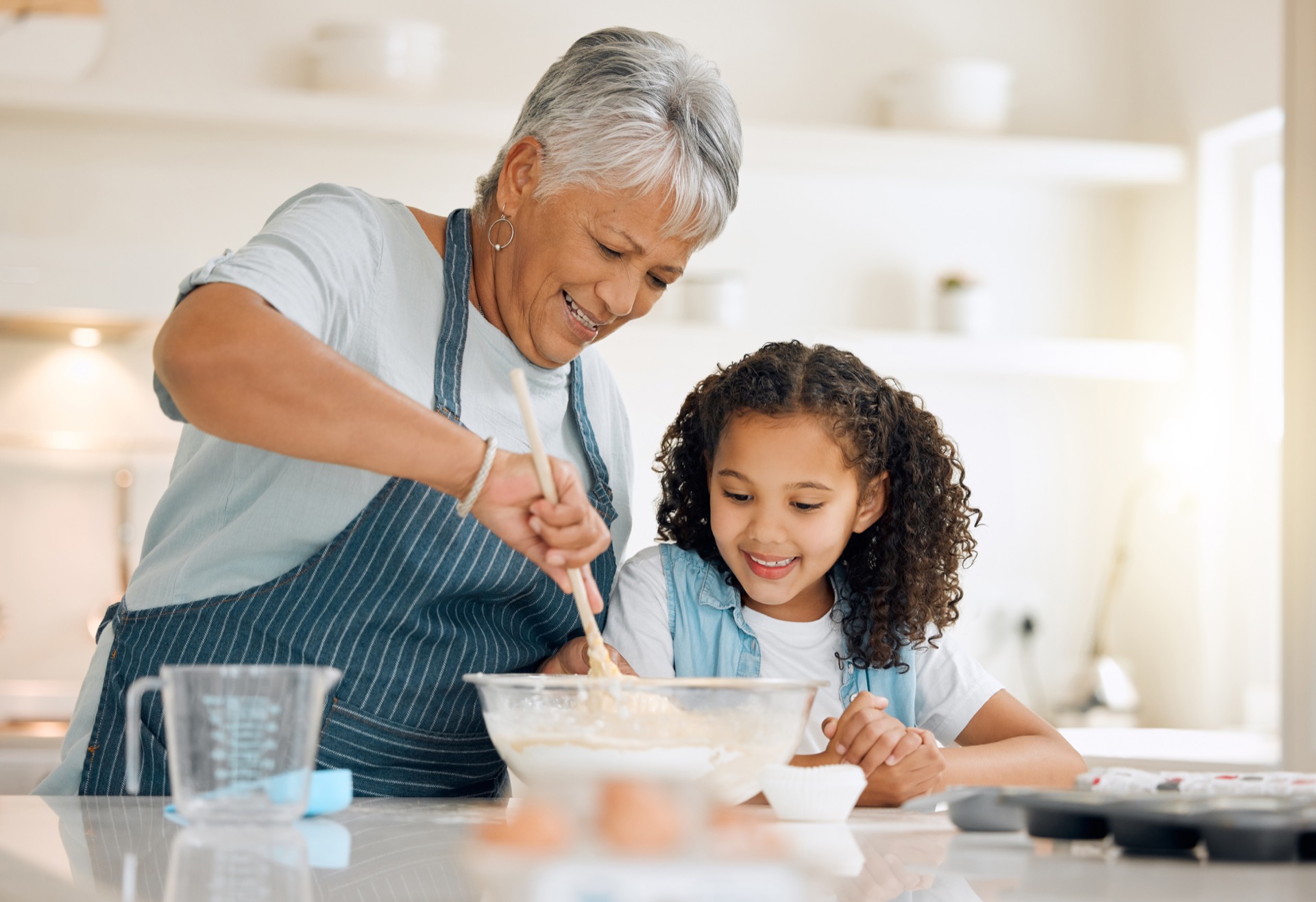 Grandmother and granddaughter for a family cookbook photo book